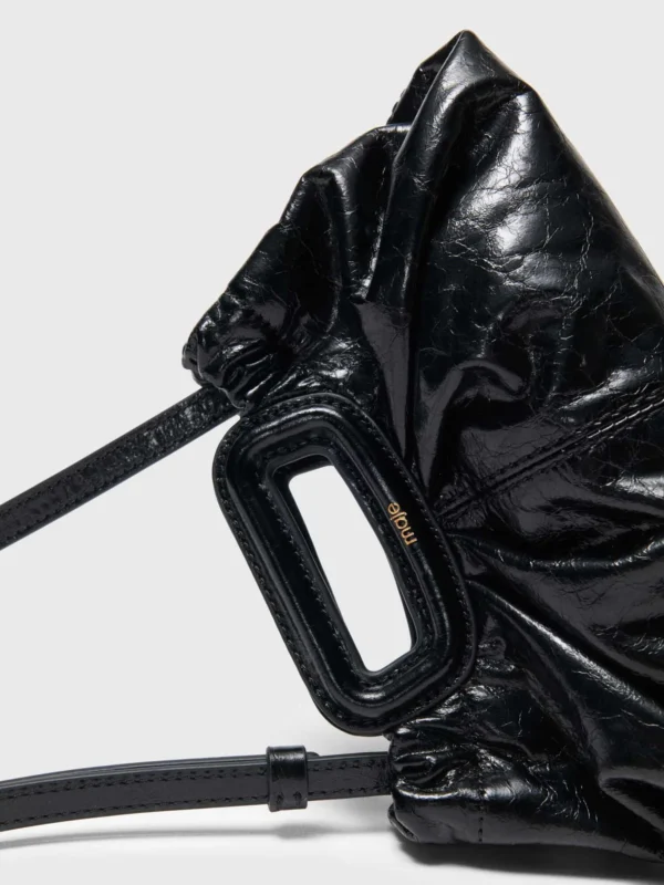 Tenue d'invitée - Blog Mariage Madame C Mini clutch en cuir craquelé Maje